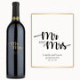 Black and gold engraved wine bottle with Mr & Mrs, names Camila & Lucas Johnson, and date 09.19.24 on the label.