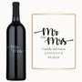 Engraved wedding wine bottle and sign reading Mr & Mrs Camila & Lucas Johnson 09.20.24.
