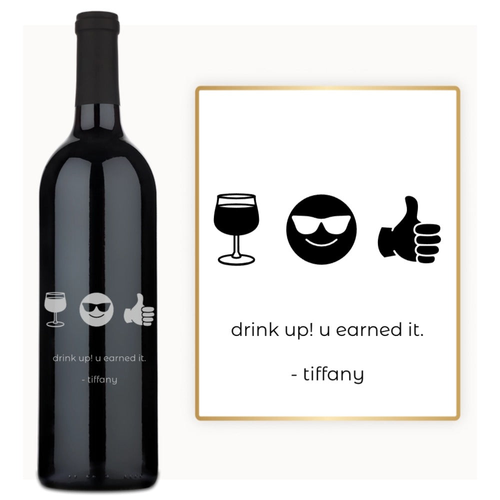Custom engraved wine bottle with emoji icons and a message: drink up u earned it. - tiffany.