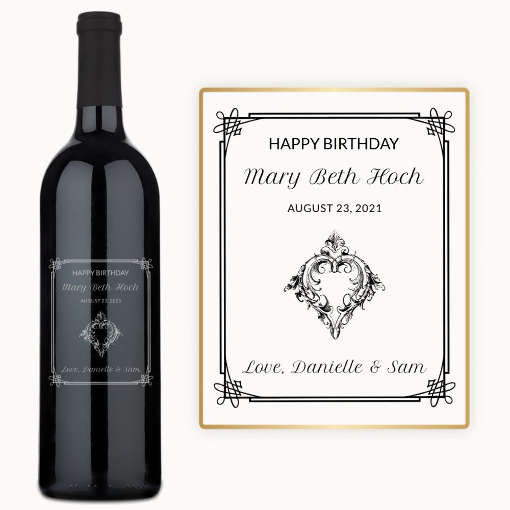 Engraved wine bottle with an elegant heart frame and a card reading Happy Birthday Mary Beth Hoch, August 23, 2021.