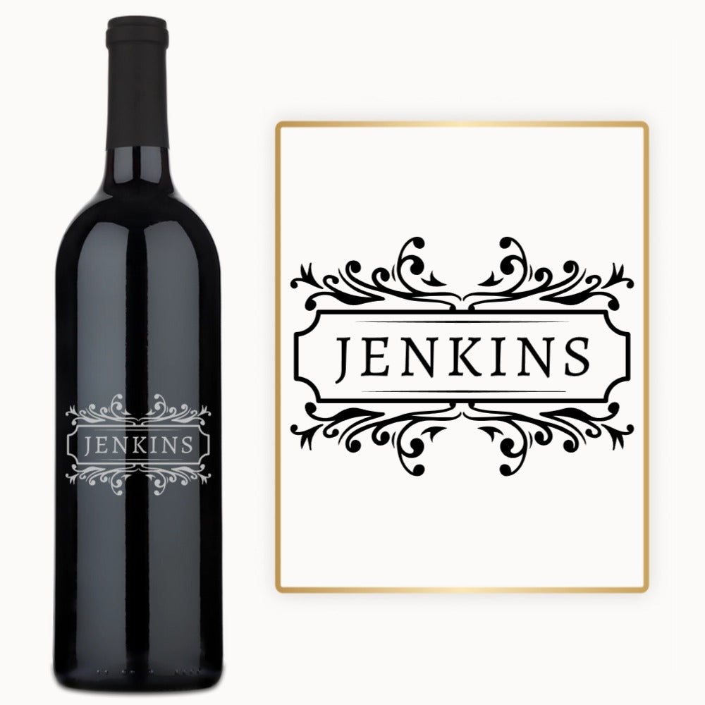 An engraved wine bottle and matching sign, both labeled Jenkins, are displayed side by side.