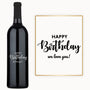 Engraved wine bottle and card, both reading Happy Birthday we love you in black script.
