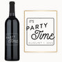 A bottle of wine labeled Party Time with custom engraving, featuring a date and a sign in view.