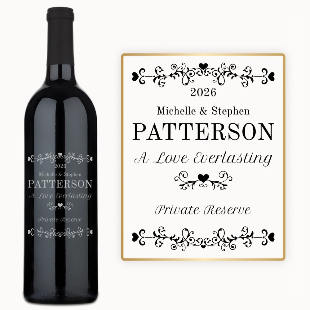A bottle of wine labeled “Heart Vines” with custom engraving and a 2026 personalized keepsake label.