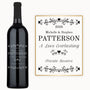 A bottle of wine labeled “Heart Vines” with custom engraving and a 2026 personalized keepsake label.