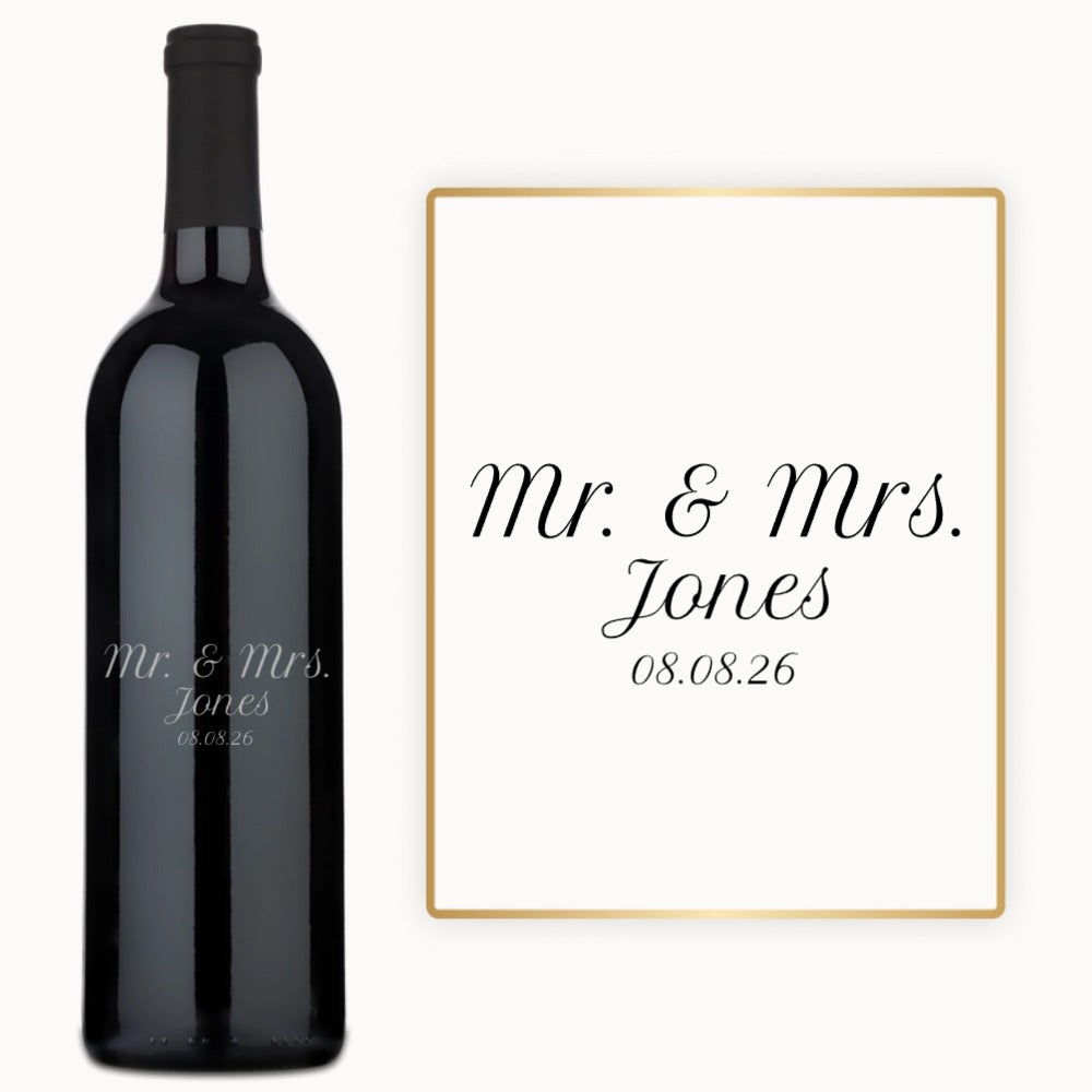 Engraved wine bottle and card displaying Mr. & Mrs. Jones 08.08.26 in elegant script font.
