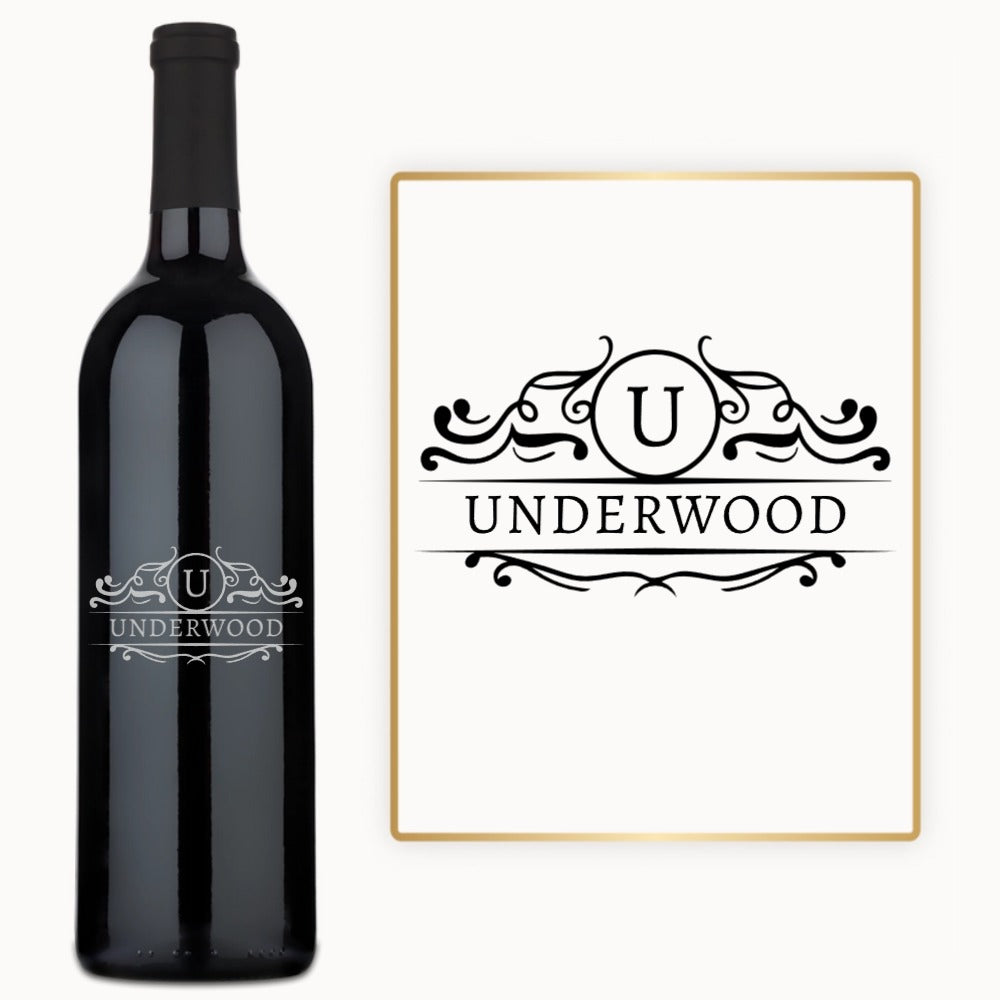 Custom engraved wine bottle featuring a circle crest monogram, displayed on a white background.