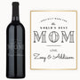 A wine bottle labeled World’s Best Mom with custom engraving, presented as a personalized gift.