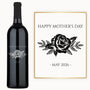 A bottle of rosé wine with an engraved rose illustration, a 2026 date, and a custom message on the label.