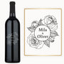 Custom rosé wine and card display with Mila & Oliver in a rose motif.