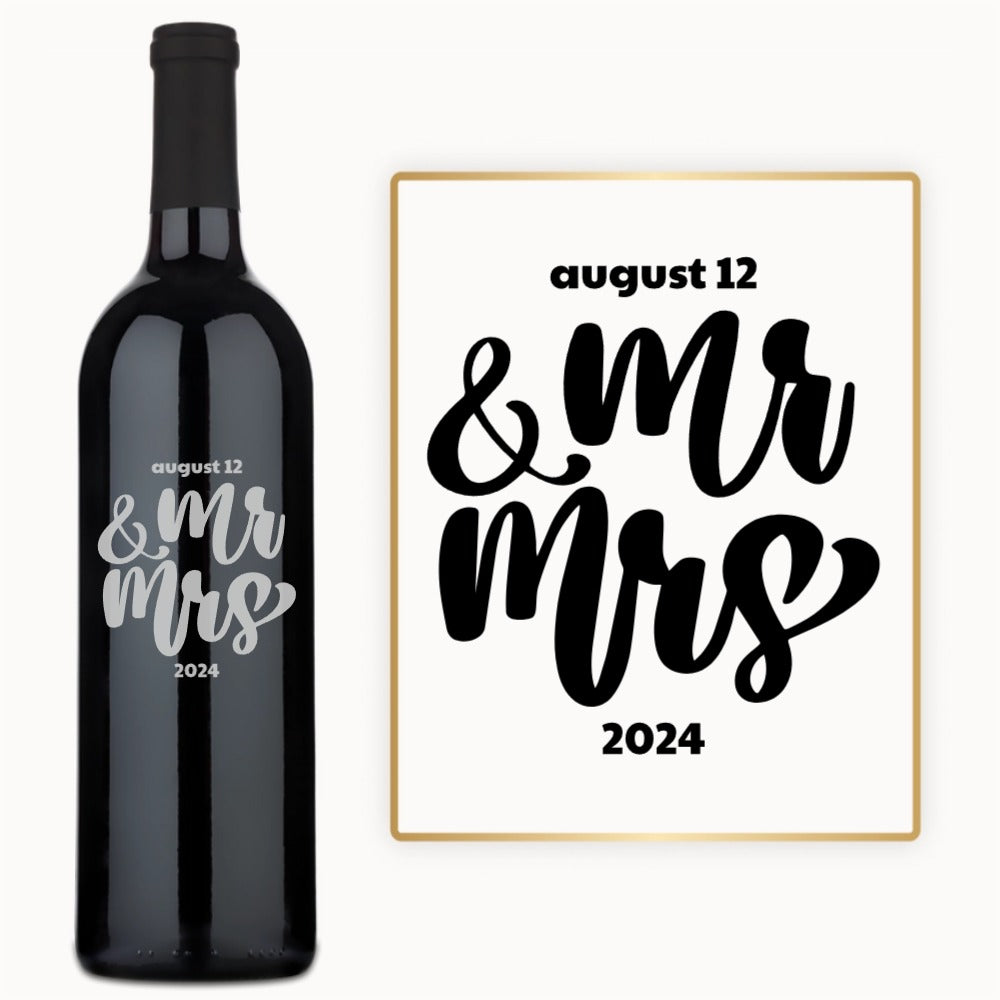 A wine bottle engraved in bold script with August 12 & Mr & Mrs 2024.