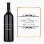 Engraved wine bottle in an elegant scroll frame reads The Davis Family Reunion, March 25, 2026.