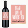A wine bottle with a custom label reading “Will you be my bridesmaid?” displayed as a personalized gift.
