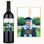 A wine bottle with a custom label featuring a graduate’s photo and graduation-themed design.
