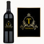 Black wine bottle and plaque labeled Thomas in gold with ornate custom scrollwork design.