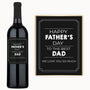 Custom-labeled wine bottle with Happy Father’s Day to Dad. We love you so much. next to a matching plaque.
