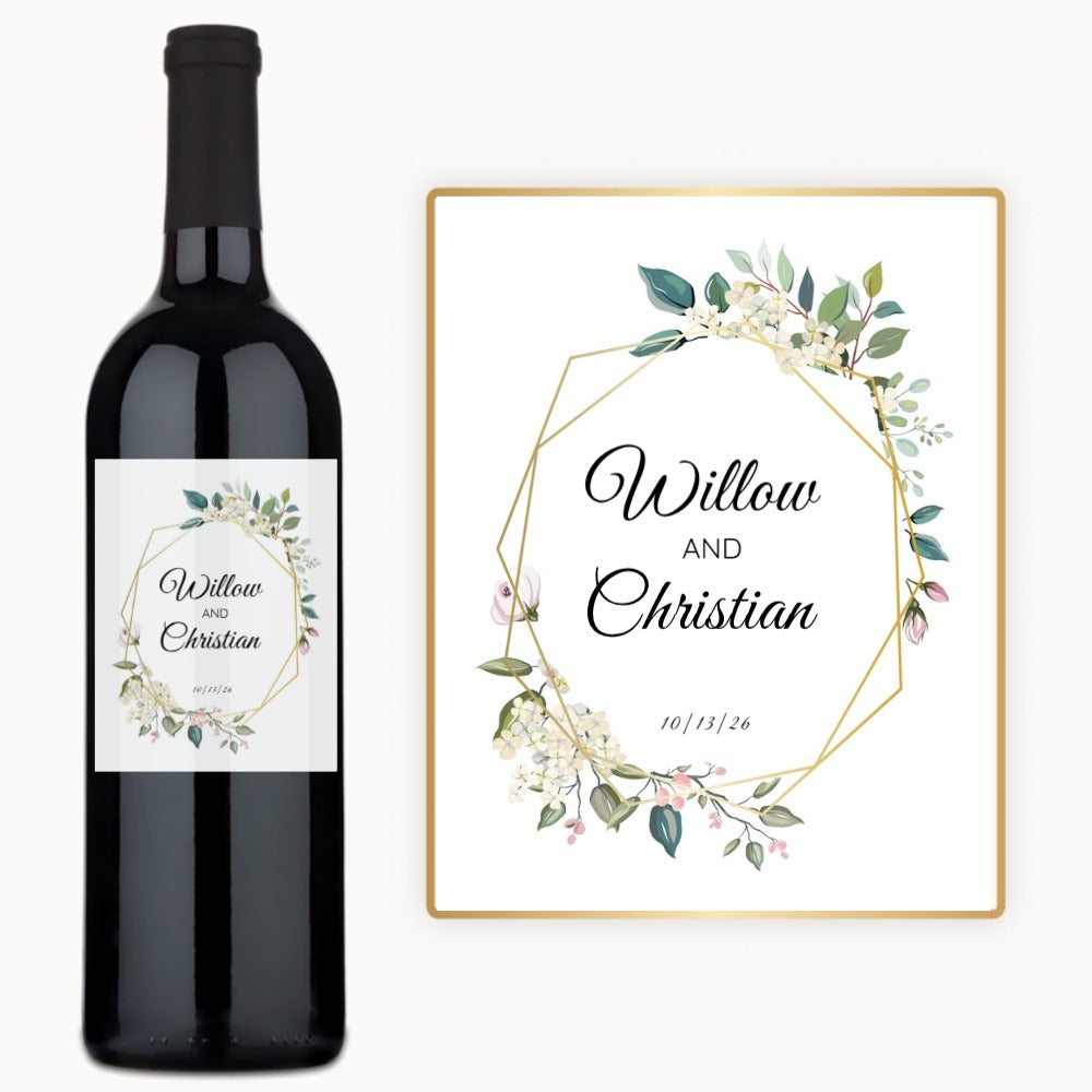 A wine bottle with a custom label featuring floral and geometric designs and personalized names.