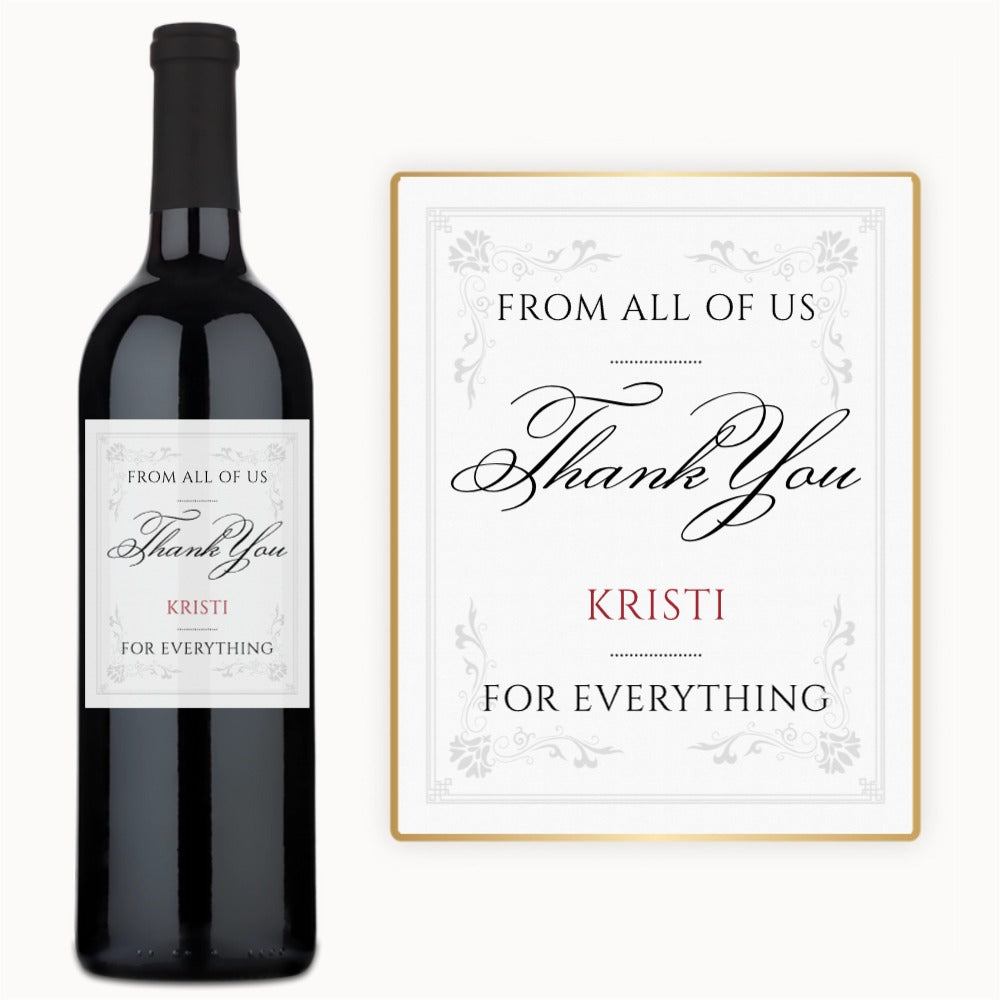 A wine bottle with an elegant script Thank You custom label, personalized for Kristi.