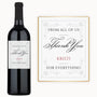 A wine bottle with an elegant script Thank You custom label, personalized for Kristi.