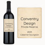 A wine bottle labeled Classic Text stands beside a close-up of its custom label.