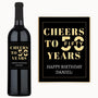 A black birthday wine bottle and sign with Happy birthday Daniel written in gold.