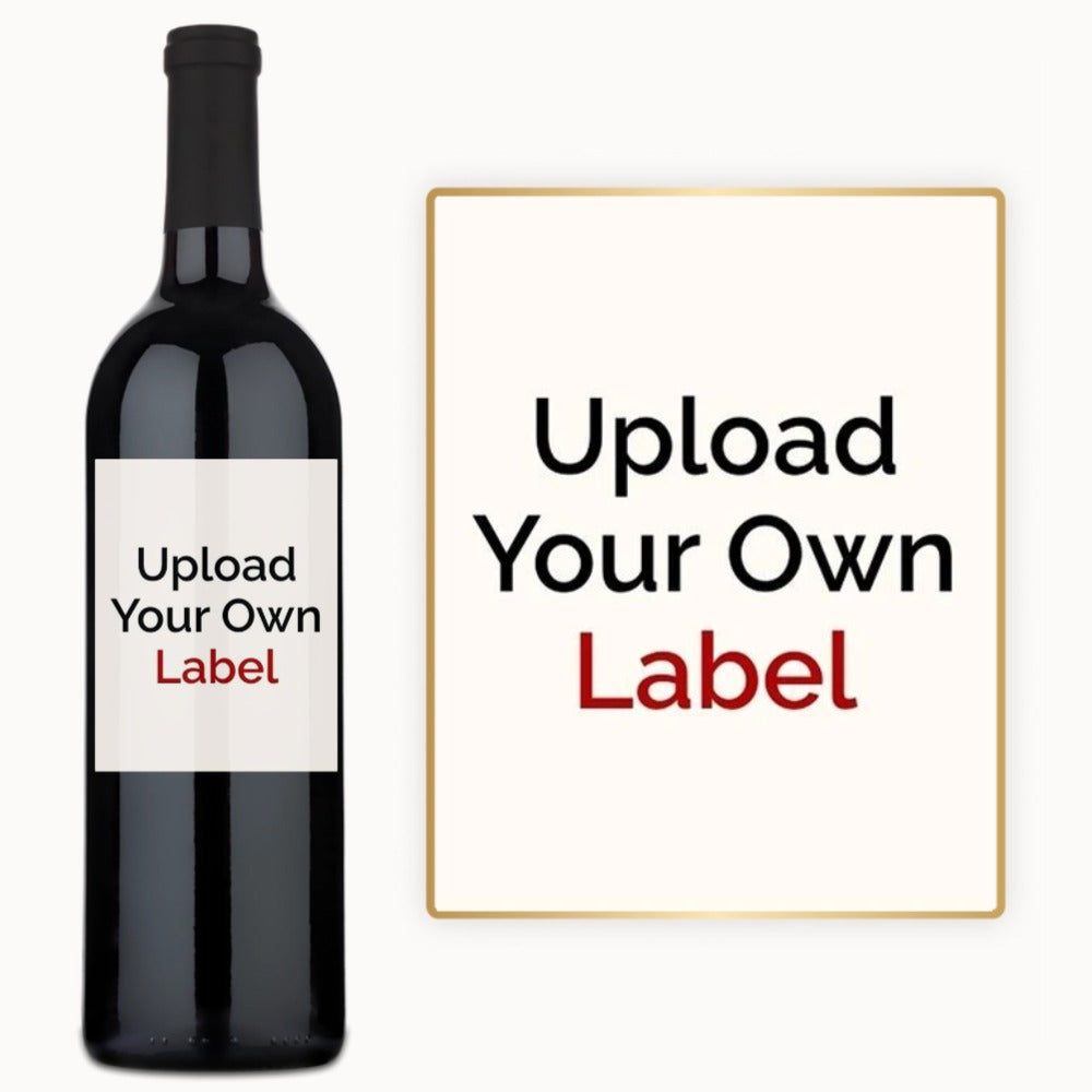 A wine bottle labeled Upload Your Own Label next to a sign with the same design.
