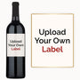 A wine bottle labeled Upload Your Own Label next to a sign with the same design.