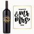 Engraved wine bottle with Mr & Mrs in bold script and the date August 12, 2024 visible on the label.