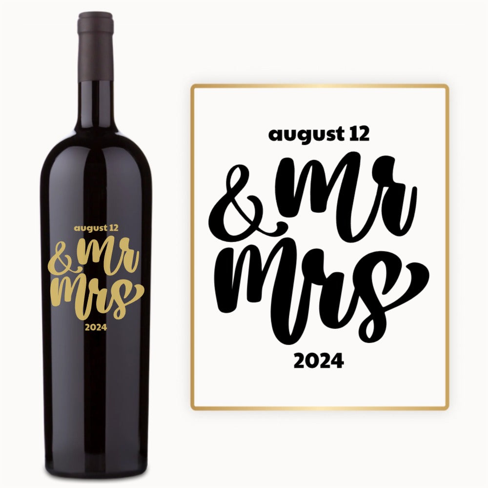 Engraved wine bottle with Mr & Mrs in bold script and the date August 12, 2024 visible on the label.