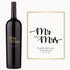 A wine bottle engraved with Mr and Mrs Camila & Lucas Johnson 09.19.24 in elegant script.