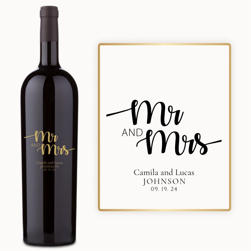 A wine bottle engraved with Mr and Mrs Camila & Lucas Johnson 09.19.24 in elegant script.