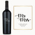 Custom-engraved wine bottle and card with Mr & Mrs in black script, presented as a wedding gift.