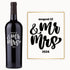 A wine bottle engraved in bold script with August 12 & Mr Mrs 2024 in black and silver.