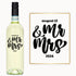 Custom engraved wine bottle and sign with “August 12 & Mr Mrs 2024” in bold black script.