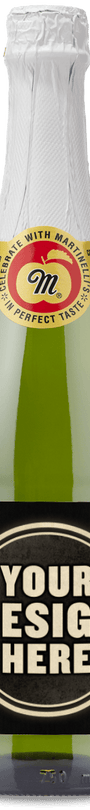 A green bottle of Martinellis Sparkling Apple Cider with a black label that reads Your Design Here.