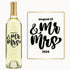 A wine bottle engraved with Mr & Mrs in bold script and August 12, 2024 in black on a white label.