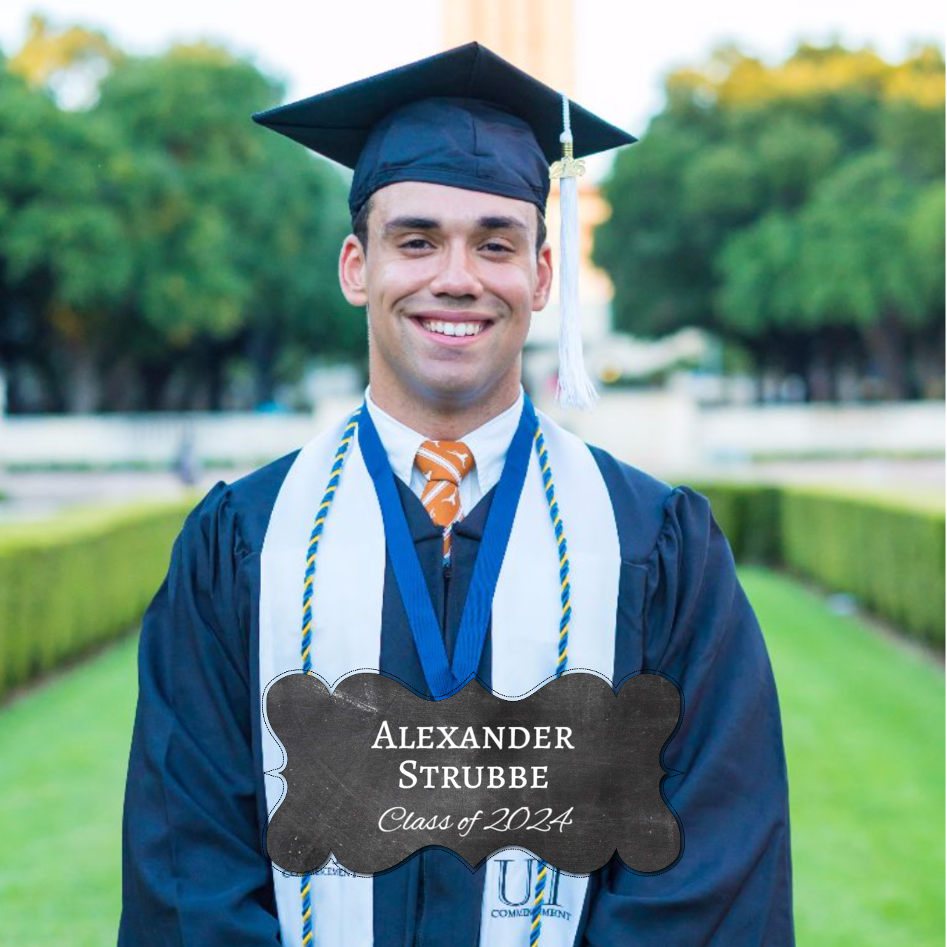A smiling graduate in cap and gown stands outdoors. Text: Alexander Strubbe, Class of 2024 graduate.