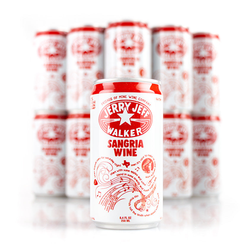 A can of JJWSangria Jerry Jeff Walker Sangria Wine stands in focus, with more cans blurred in the Coconut Grove background.