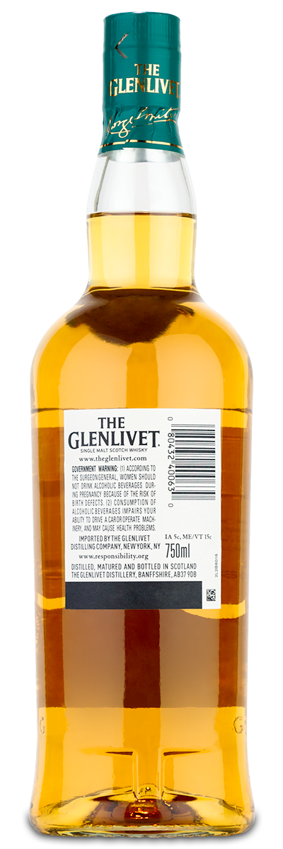 A bottle of The Glenlivet 12 Year Single Malt Scotch with a green cap and white label.