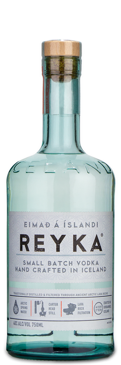 Clear Reyka Vodka bottle with wooden cap and Icelandic-style label.