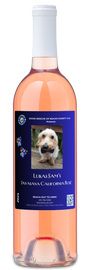 A bottle of personalwines Doxie Rescue | Lukas Sams Savasana California Rosé with a blue dog label.