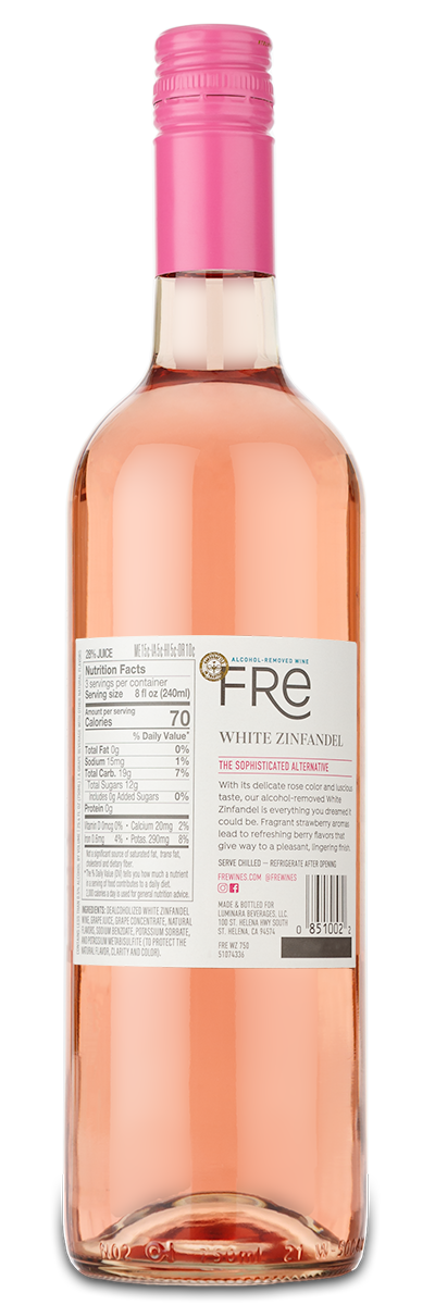 A bottle of Fre White Zinfandel (Alcohol Removed) with a pink cap and light pink label, shown from the back.