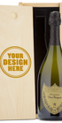 A Dom Perignon Champagne bottle displayed in a custom-engraved wooden wine box.