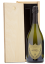 A Dom Perignon bottle and an engraved wooden box with black interior lining are shown side by side.