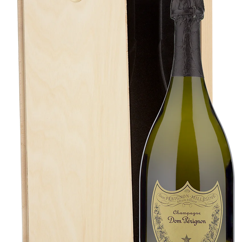 A Dom Perignon Champagne bottle displayed in a plain wooden wine box.