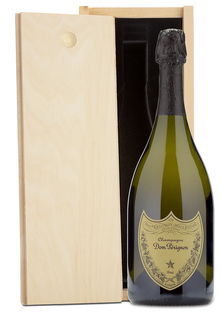 A Dom Perignon Champagne bottle displayed in a plain wooden wine box.