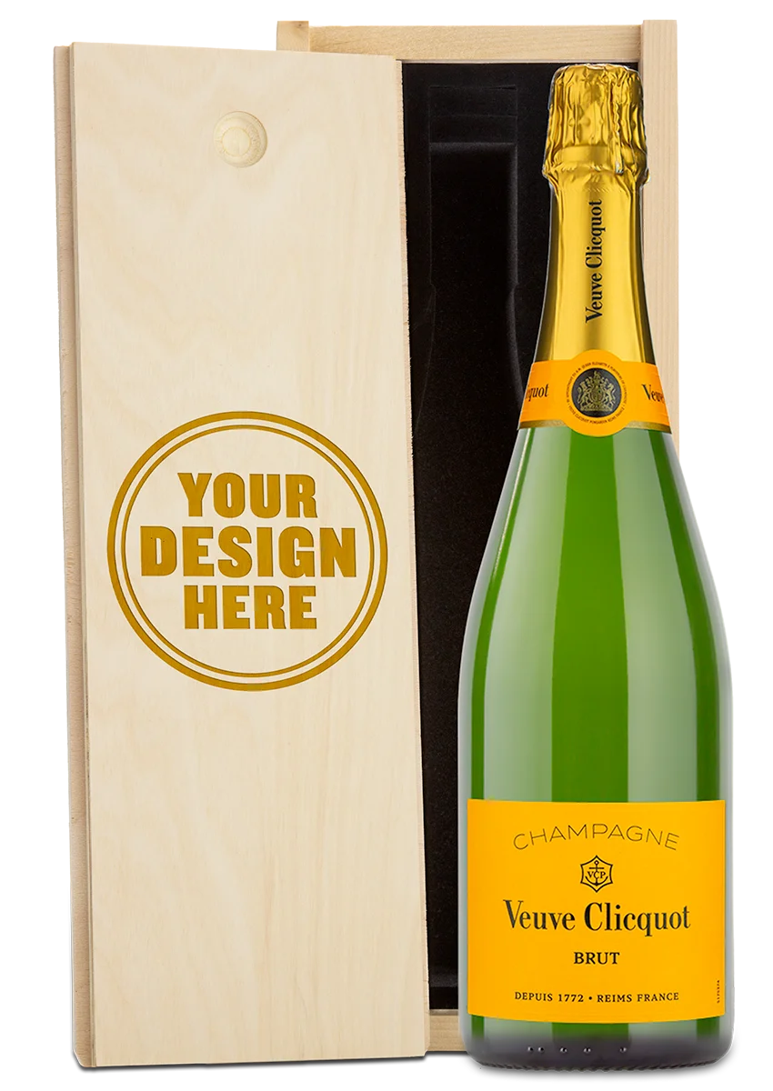 A Veuve Clicquot champagne bottle in a wood gift box with an engraved lid showing personalized text.