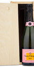 A Veuve Clicquot Custom Wood Box Combo by moet-hennessey stands beside its engraved wooden box.