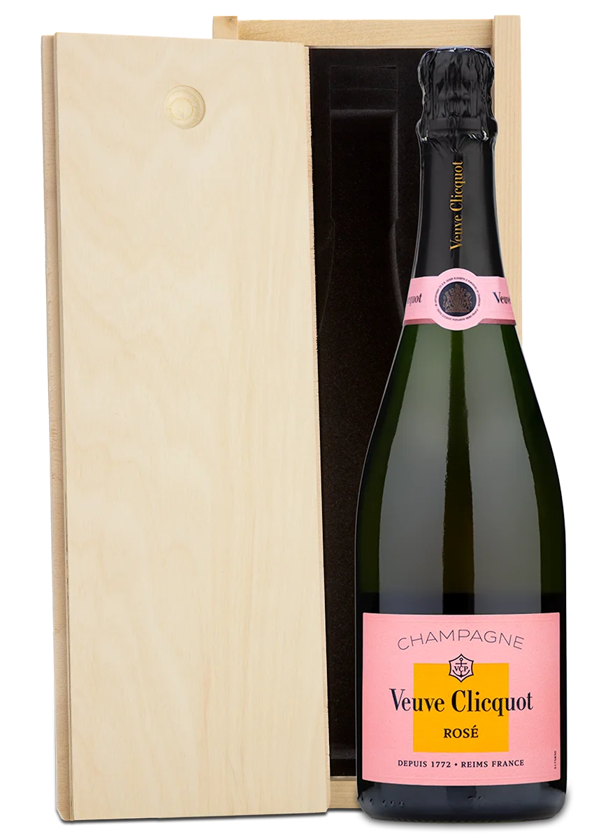 A Veuve Clicquot Custom Wood Box Combo by moet-hennessey stands beside its engraved wooden box.