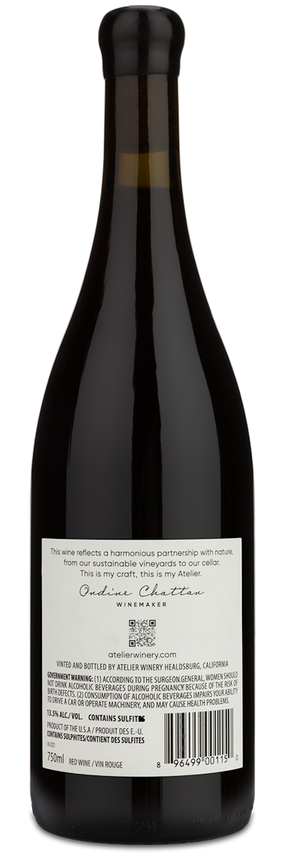 Bottle of Atelier featuring the winery back label.